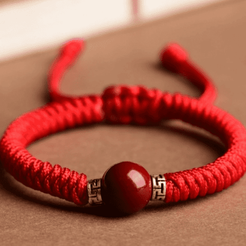 Click to view full screen Tibetan Cinnabar Red Rope Bracelet photo review