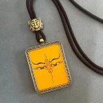 Yellow Jambhala Wealth Thangka Pendant